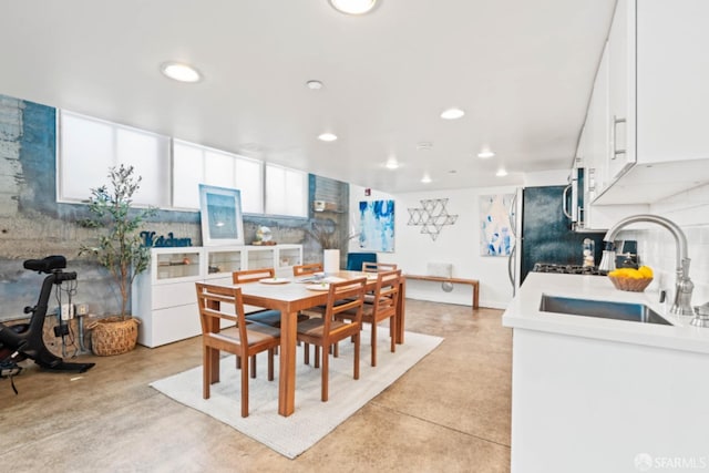 dining space with sink