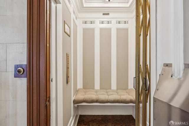 interior space with crown molding