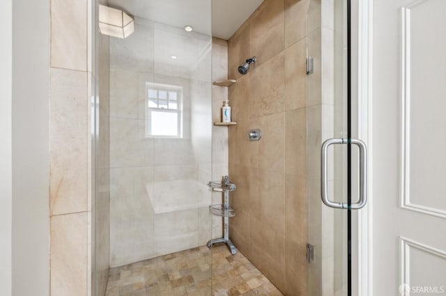 bathroom with an enclosed shower