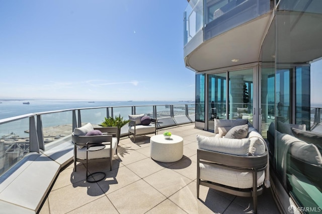 338 Main St Unit Ph36B, San Francisco, CA 94105 - view of patio / terrace with a water view, a balcony, and an outdoor hangout area