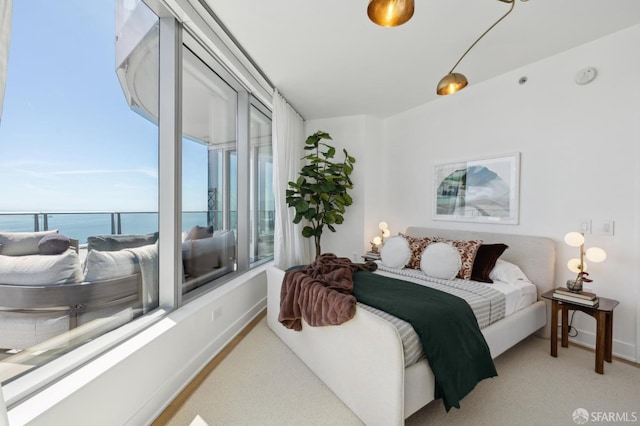 338 Main St Unit Ph36B, San Francisco, CA 94105 - carpeted bedroom featuring baseboards and a water view