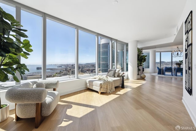 338 Main St Unit Ph36B, San Francisco, CA 94105 - sunroom / solarium with healthy amount of natural light, a water view, and a chandelier