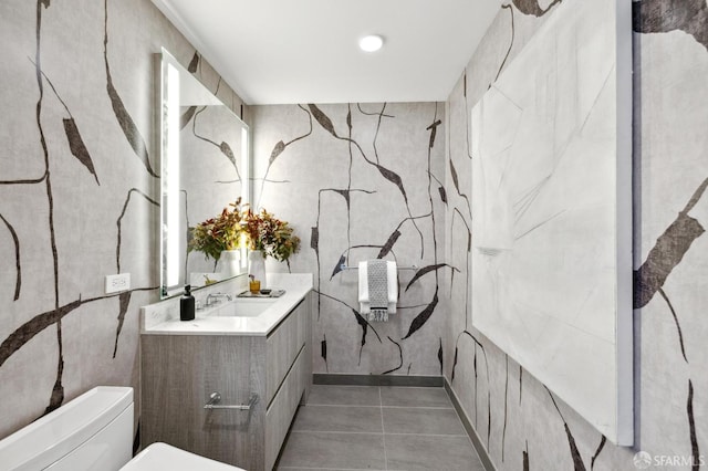 338 Main St Unit Ph36B, San Francisco, CA 94105 - bathroom featuring toilet, vanity, and tile patterned floors