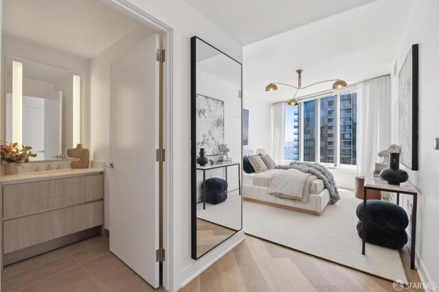 338 Main St Unit Ph36B, San Francisco, CA 94105 - bedroom featuring a sink and ensuite bath