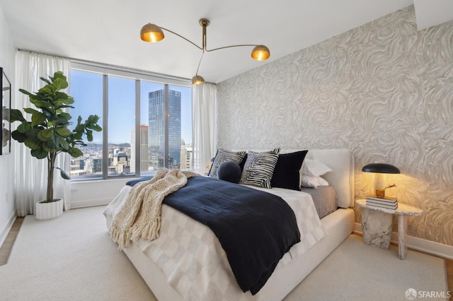 338 Main St Unit Ph36B, San Francisco, CA 94105 - bedroom with wallpapered walls, baseboards, and a city view