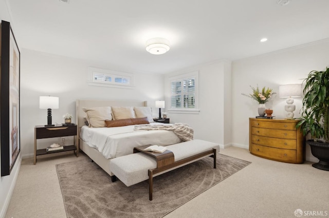 bedroom featuring light carpet and crown molding