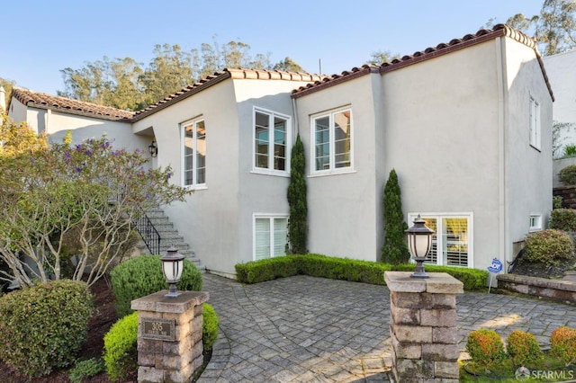 back of property with a patio area