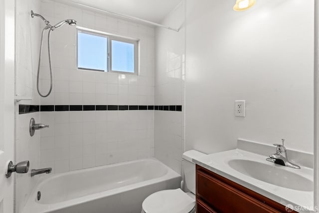 bathroom with vanity, shower / tub combination, and toilet