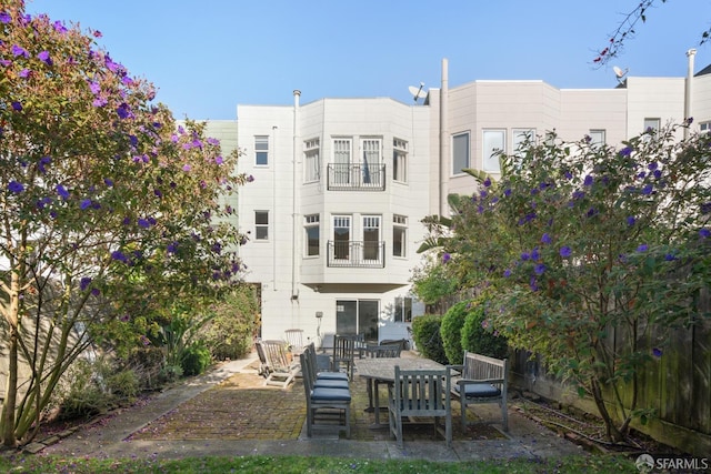 rear view of house with a patio