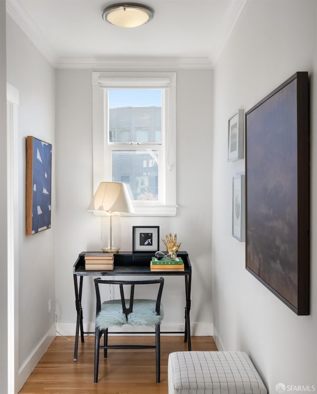 office space featuring ornamental molding and wood-type flooring