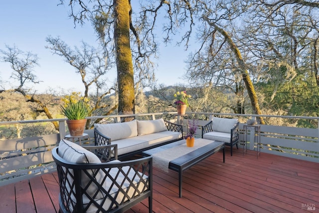 deck featuring outdoor lounge area
