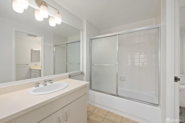 6363 Christie Ave Unit 1823, Emeryville, CA 94608 - bathroom featuring visible vents, tile patterned flooring, vanity, toilet, and shower / bath combination with glass door