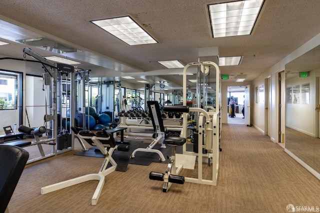 6363 Christie Ave Unit 1823, Emeryville, CA 94608 - gym featuring baseboards and carpet flooring