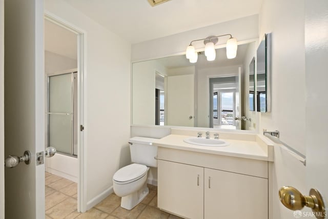 6363 Christie Ave Unit 1823, Emeryville, CA 94608 - bathroom featuring vanity, enclosed tub / shower combo, tile patterned floors, and toilet