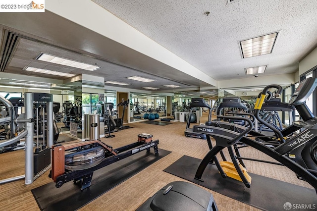 6363 Christie Ave Unit 1823, Emeryville, CA 94608 - gym with carpet and a textured ceiling