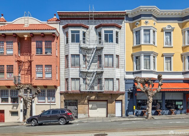 view of building exterior with an attached garage
