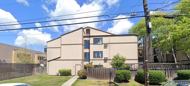 exterior space featuring a front lawn