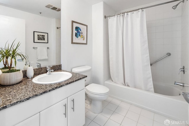 full bathroom featuring vanity, shower / tub combo, tile patterned flooring, and toilet