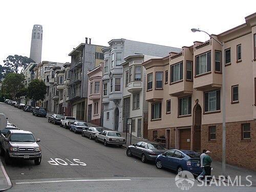 view of building exterior featuring a residential view