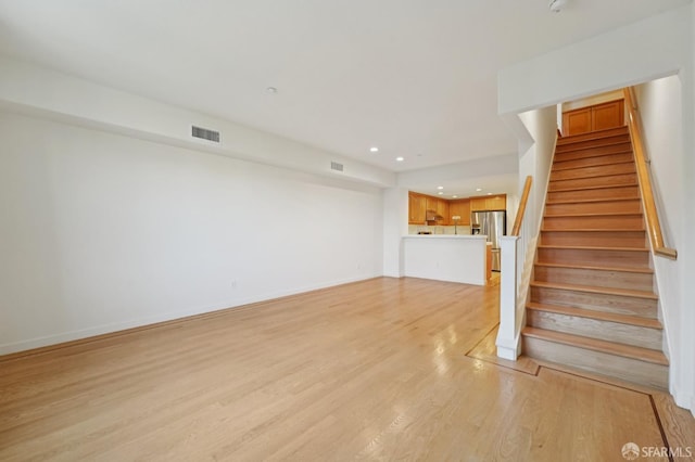 104 Diamond Cove Ter, San Francisco, CA 94134 - stairway featuring wood finished floors and recessed lighting