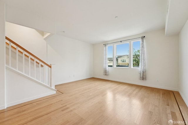 104 Diamond Cove Ter, San Francisco, CA 94134 - empty room with wood finished floors and stairs
