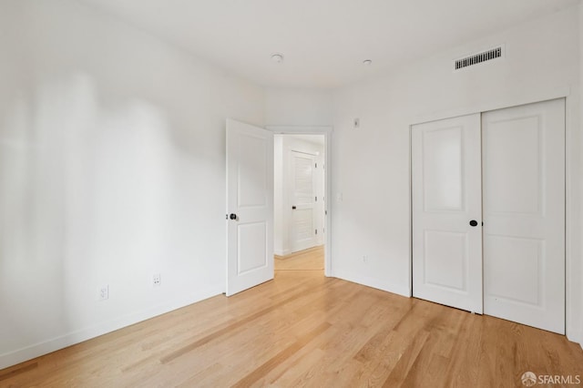 104 Diamond Cove Ter, San Francisco, CA 94134 - unfurnished bedroom with light wood finished floors and a closet