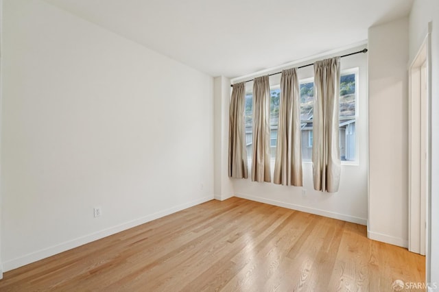 104 Diamond Cove Ter, San Francisco, CA 94134 - empty room with baseboards and light wood-type flooring