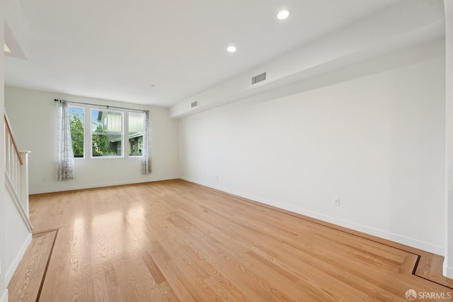 104 Diamond Cove Ter, San Francisco, CA 94134 - unfurnished room with light wood finished floors, stairs, and recessed lighting