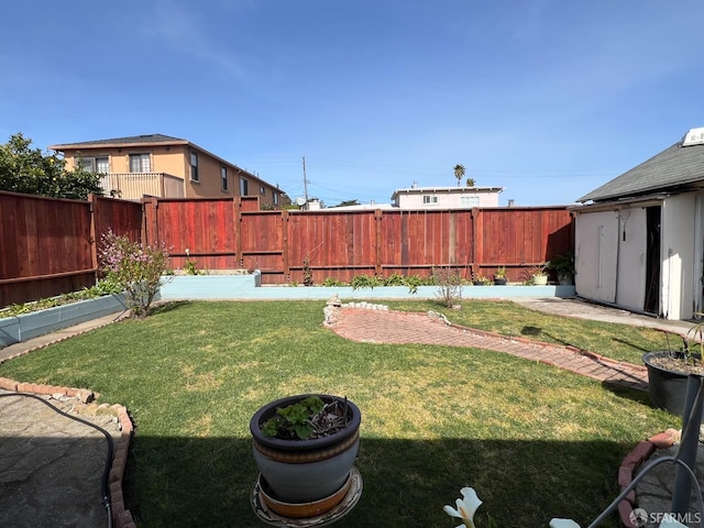 view of yard featuring a fenced backyard
