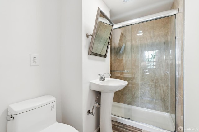682 37th Ave, San Francisco, CA 94121 - bathroom with toilet, a stall shower, and a sink