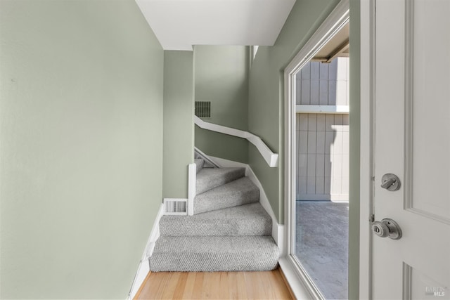 66 Bridge Rd, Novato, CA 94945 - staircase with wood finished floors and baseboards