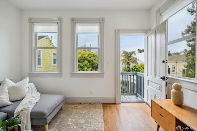 3511 23rd St Unit 1, San Francisco, CA 94110 - living area featuring plenty of natural light and wood finished floors