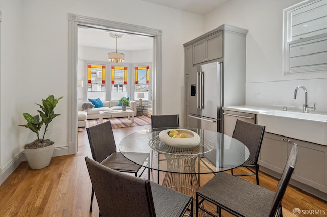 3511 23rd St Unit 1, San Francisco, CA 94110 - dining room with light wood-type flooring