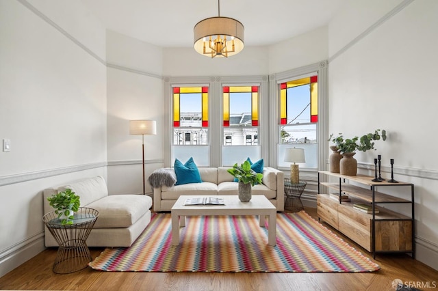 3511 23rd St Unit 1, San Francisco, CA 94110 - living room featuring wood finished floors and a chandelier