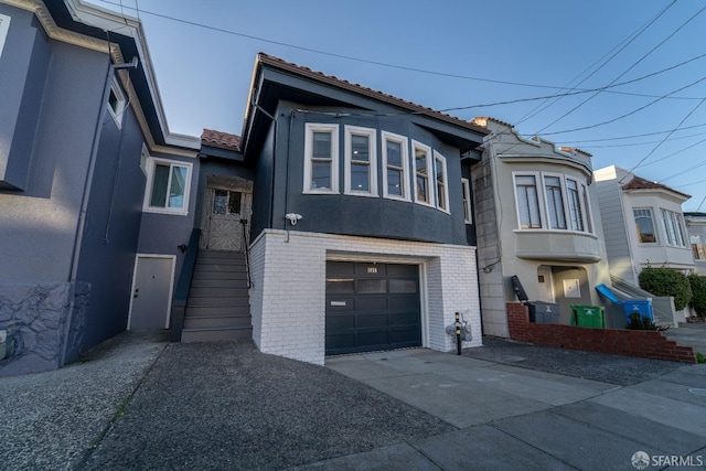 view of front of home with a garage