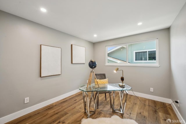 office space with wood finished floors, baseboards, and recessed lighting