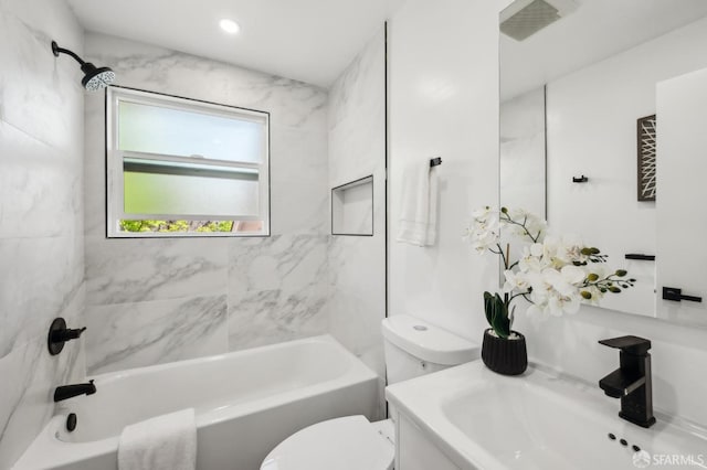 bathroom with shower / bathtub combination, visible vents, vanity, and toilet