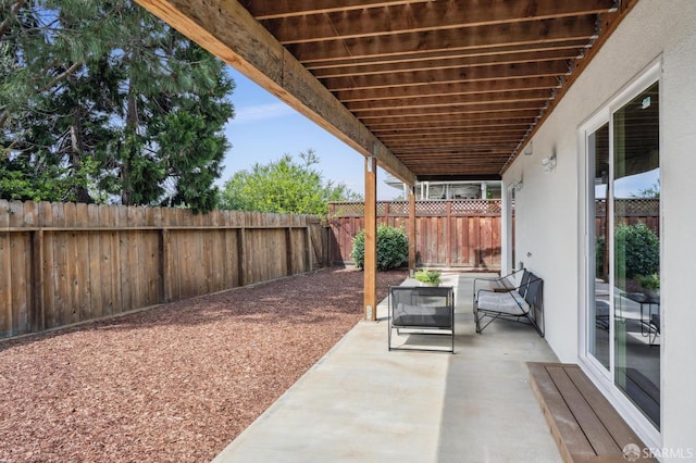 view of patio with a fenced backyard