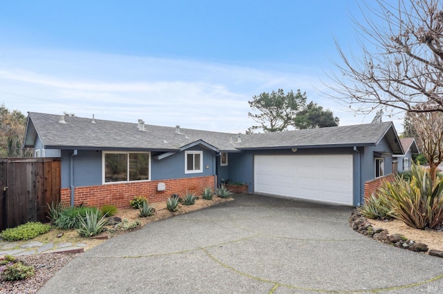 ranch-style home with a garage