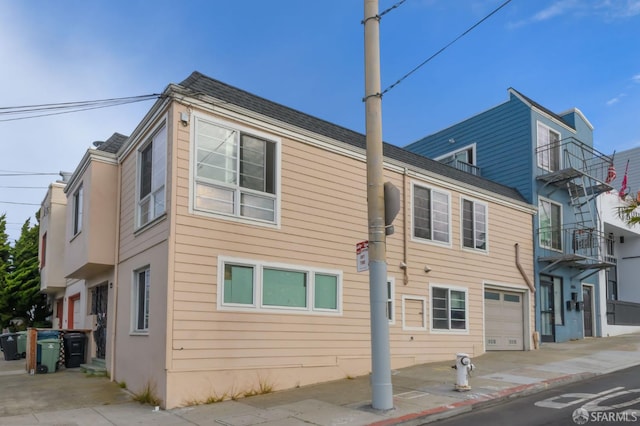 back of house with a balcony