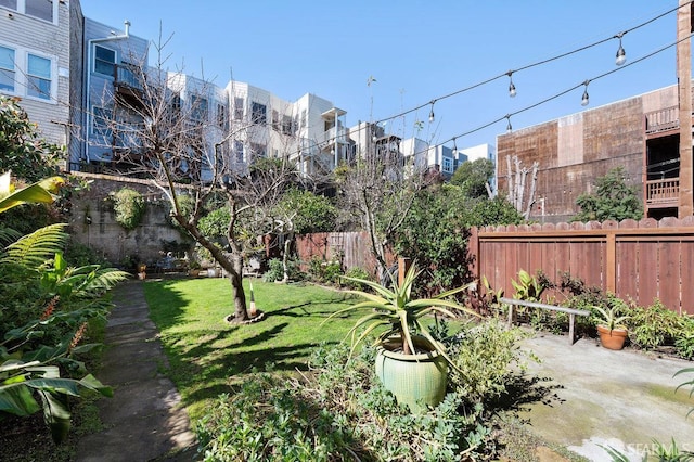 view of yard featuring a patio area and fence