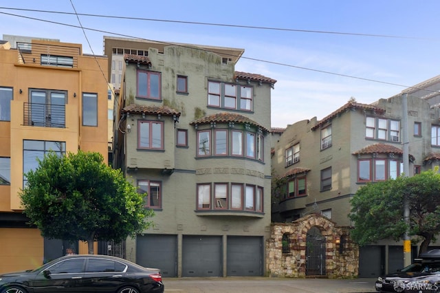 view of building exterior with an attached garage