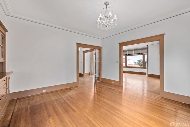135 San Rafael Way, San Francisco, CA 94127 - spare room featuring a chandelier, light wood-style flooring, baseboards, and crown molding