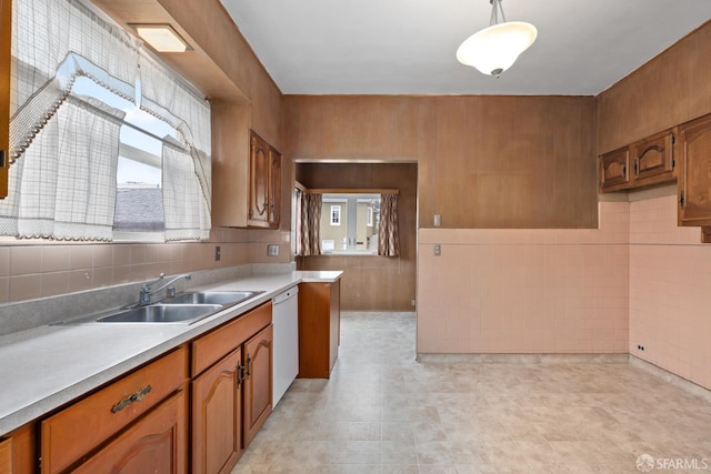 135 San Rafael Way, San Francisco, CA 94127 - kitchen featuring dishwasher, plenty of natural light, brown cabinets, light countertops, and tile walls