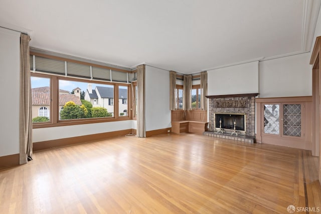 135 San Rafael Way, San Francisco, CA 94127 - unfurnished living room with light wood-style flooring, a fireplace, and baseboards