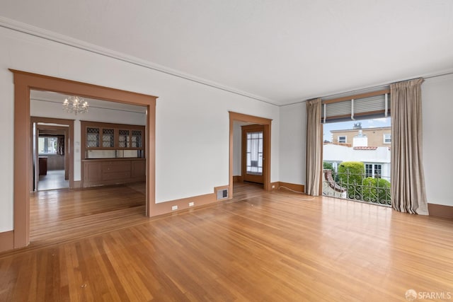 135 San Rafael Way, San Francisco, CA 94127 - unfurnished room featuring a chandelier, wood finished floors, and baseboards