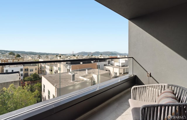 balcony featuring a mountain view