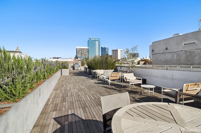 deck featuring a view of city