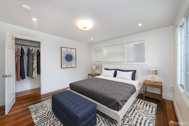 bedroom with recessed lighting, baseboards, and wood finished floors