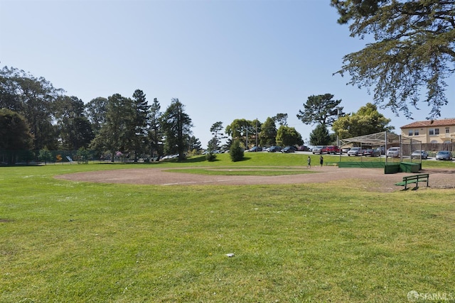 view of property's community with a yard